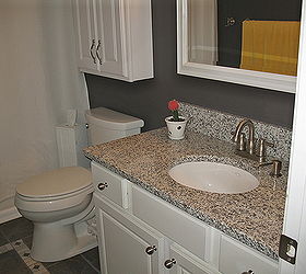 from playful kid s bathroom to sophisticated adult teen bathroom on a budget not, bathroom ideas, diy, home decor, AFTER New mirror toilet sink granite knobs paint on the walls curtains