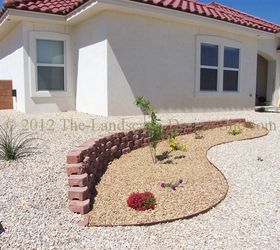 desert southwest landscaping on a small hillside circular driveway using retaining, landscape, outdoor living, Lower view of the steepest area and highest retaining wall With these smaller type retaining wall blocks it s a good idea to not stack them much higher than this The plants inside are Diascia Verbena Lantana and a Chitalpa tree