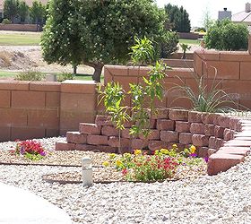 desert southwest landscaping on a small hillside circular driveway using retaining, landscape, outdoor living, Another view of the steepest area of the landscape This angle gives a better idea of how steep and quick of a drop it is Again as with the rest of the landscaping the plants are newly planted and will take a while to grow in and add more character to the area