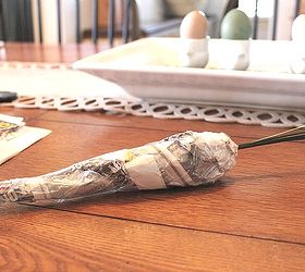 diy newspaper easter carrot decor, crafts, easter decorations, seasonal holiday decor