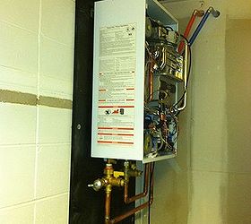 sediment in a hot water heater, home maintenance repairs, plumbing, Another side shot of the heater It vents with three inch PVC pipe