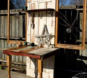 potting tables from random bits, gardening, painted furniture, repurposing upcycling, Old door fence boards table legs two old screen window frames left over electric fence wire the large dragonflies and two drawer pulls to hang your towels and tools on