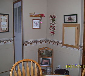 before and after redo with ashley cole mobile home kitchen remake, home decor, kitchen design, This wall was a horrid blue pink white combo vinyl UGH Using Kilz for vinyl walls we were able to cover every inch with a nice easy on the eyes Bisque add the bumper rail and then add all kinds of goodies found at Goodwill