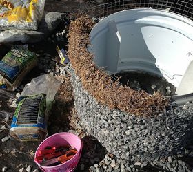 gabion planter from defunct clothes dryer, gardening, repurposing upcycling, succulents, The top edge is finished with long cut peat moss that will be a growing medium for trailing succulents