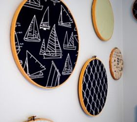 the nautical nursery that changed our lives, bedroom ideas, home decor, Embroidery hoops hold nautical themed fabric for a quick and easy wall display