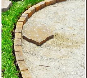 fire pit patio, outdoor living, patio, An edging stone was used to keep everything contained at grass level Plastic edging at garden area Fill in with more screening Tamper the limestone down water tamper again Best to let sit a couple of days