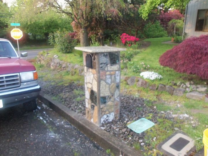 well i live on mt scott in portland oregon and we didnt get much snow this rear but, curb appeal, going to take out little stone wall behind mailbox put up small block wall and cover it mosaic