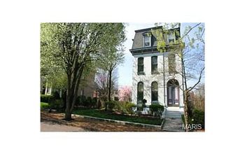 Pick the house you like best! Two Victorians for sale on the same street in St Louis MO