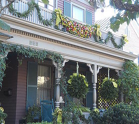 one our christmas winners magnificent fresh boxwood orbs on the front porch and an, christmas decorations, curb appeal, porches, seasonal holiday decor, Christmas in Historic Oakwood