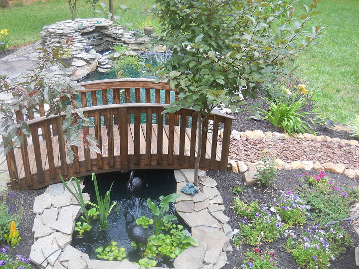 Pond & flagstone patio finished. The pond is 9x16 and we needed an excavation machine to dig it out. So he dug and graded it for me and I did the building.