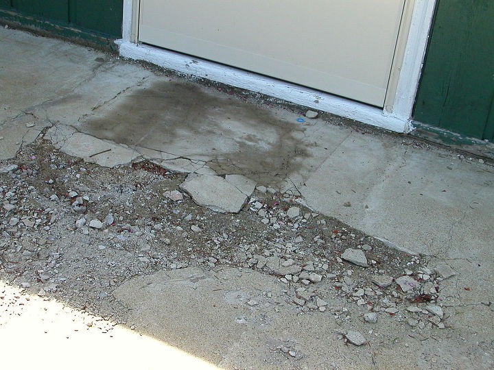 how can i salvage a crumbling cracked 24x24 triangle shaped concrete patio without, outside back door