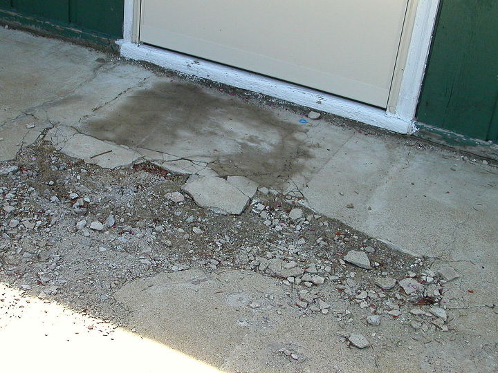 how can i salvage a crumbling cracked 24x24 triangle shaped concrete patio without, outside back door