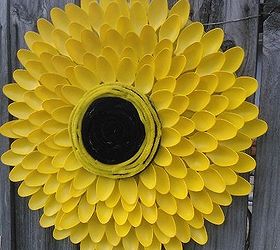 tutorial garden sunflower from plastic spoons, crafts, repurposing upcycling, 100 plastic spoons and some spray paint Cut the handles off y our spoons before you start hot gluing