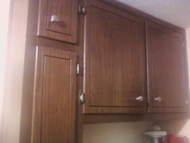 is it possible to paint old and dark stained wooden kitchen cabinets to lighten the, kitchen design, painting