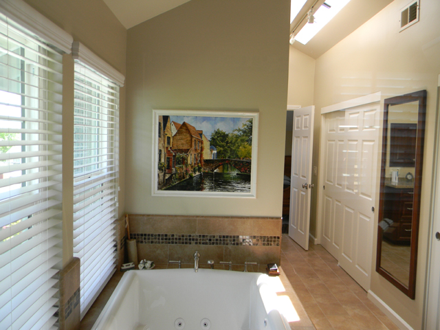 i wanted to share a new tile mural installation sent to me by my client, Here is the after picture of the bathroom The tile mural is featured over the tub