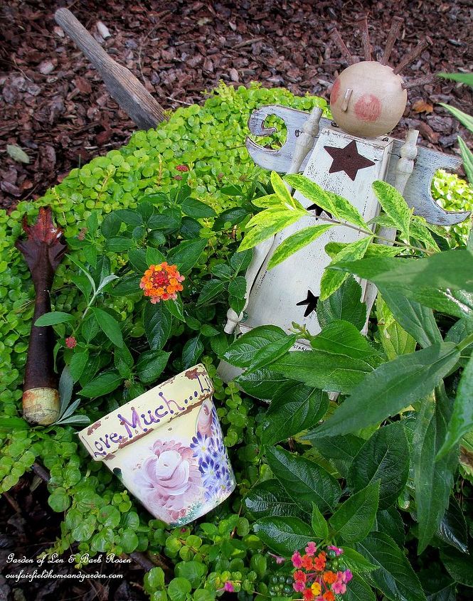 fall is in the air, flowers, gardening, seasonal holiday d cor, wreaths, Angel in the planted wheelbarrow