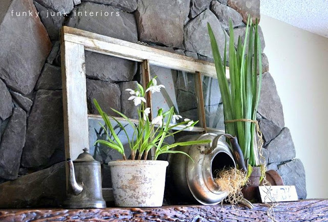 a spring fireplace mantel that never wilts, fireplaces mantels, flowers, home decor, Pretty greens although faux ring in spring perfectly on this fireplace mantel The decor is very simple but sometimes that s all you really need