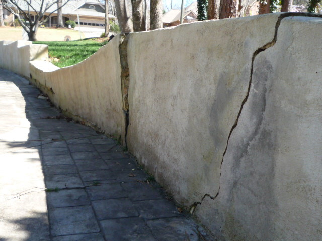 q i really want to remove part of the retaining wall, concrete masonry, fences, outdoor living