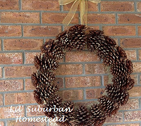 too many pine cones in your yard make a diy pinecone wreath, crafts, seasonal holiday decor, wreaths, This is what the finished product looks like Ribbons are not my area of expertise but the better you are with ribbons I think the better the finished product will look