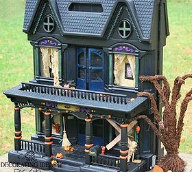 easy halloween decoration to make, crafts, halloween decorations, seasonal holiday decor, This haunted house sits on my buffet During my Halloween party it is the center of attention