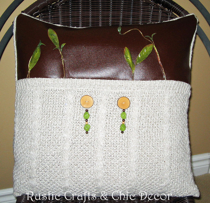 upcycled sweater throw pillow, crafts, repurposing upcycling, I used an old sweater a leather fabric scrap some homemade wooden buttons beads and silk leaves