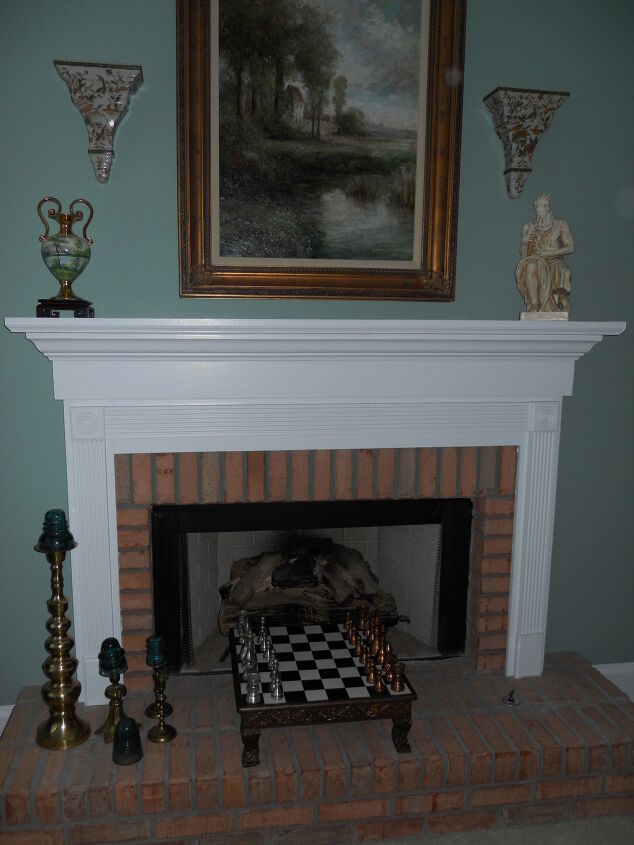 this is what i did for a client who had antique telephone pole insulators and old, basement ideas, home decor, I glued the insulators to the brass candle sticks