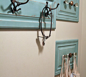 check out this coat hanger i made out of old cabinet doors, repurposing upcycling, this is the final product I love the color and the use of vintage door knobs as hooks