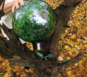 lighted gazing ball, Lights all inserted into the INSIDE of the gazing ball This is how the ball will sit in the crook of the log
