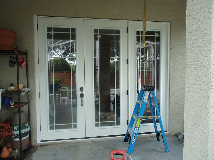 we had a huge 3 panel sliding glass door that wouldn t seal was off of it s track it, French doors