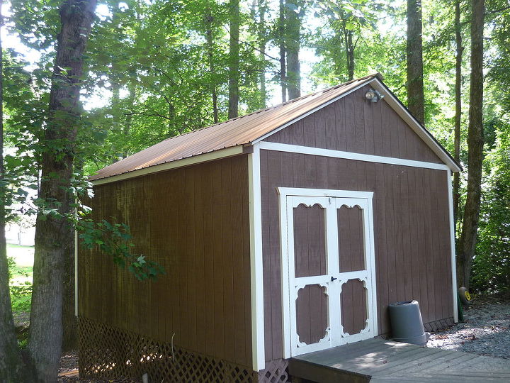 ahh a tin roof well rather a galvanized metal one remember that wonderful sound on, curb appeal, home maintenance repairs, roofing, installers thru in the metal roofing for my little shed and I used scraps to build side overhang