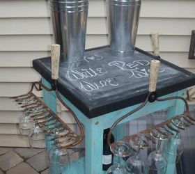 Fun rolling wine cart made with vintage rakes & an old butcher block table