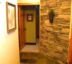 cozy cabin in the woods retreat and fallingwater, home decor, The entry way boasted a beautiful stone wall