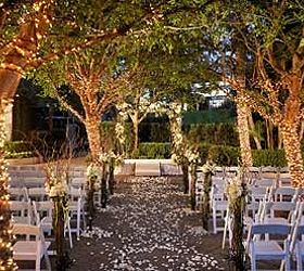 how to wrap lights around trees, diy, how to, lighting, outdoor living, Right before sunset the bride walks down the aisle lit to reflect a magical ambiance