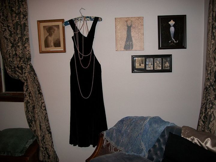 guest bedroom redo, bedroom ideas, home decor, remodeled guest room dress on wall was my grandmother s and her pearls along with photos of her All done in black white