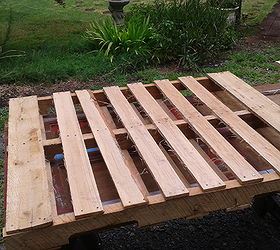 expanding patio with repurposed pallets, patio, woodworking projects