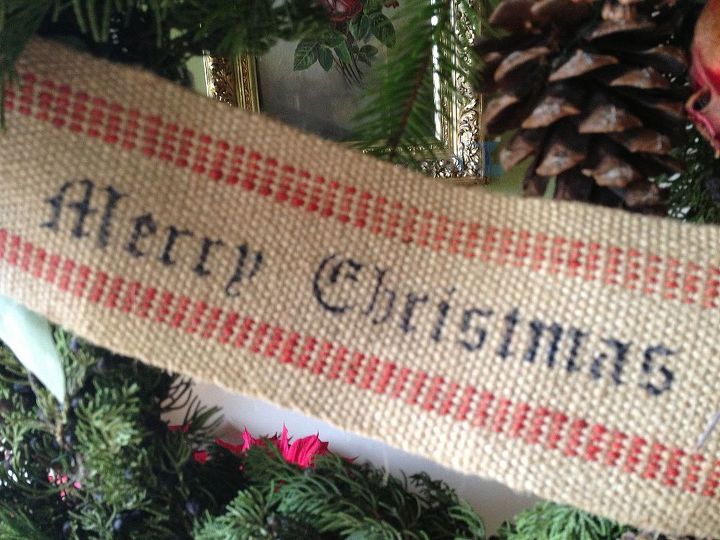 christmas wreath gets personal, christmas decorations, crafts, seasonal holiday decor, wreaths, Using upholstery webbing I stenciled the words using a template and permanent marker pen