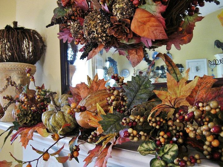 my fall mantel natural elements and textures pumpkins gourds pine cones lichen, home decor, seasonal holiday decor, wreaths, I love the chunky garland with its pumpkins gourds and berries so pretty and easy Just put it on the mantel and you are almost done
