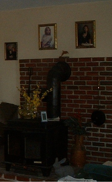 can you hang a flat screen tv over a woodstove, previous owners photo of woodstove setup