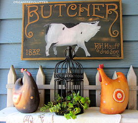 covered patio outdoor vignettes, home decor, outdoor living, repurposing upcycling, I displayed the bird cage with roosters and a pig sign