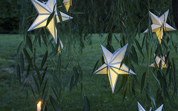  Crie uma pequena atmosfera com as lanternas de papel em forma de estrela