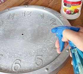 aging a galvanized clock, crafts, Spritz the whole surface with bleach