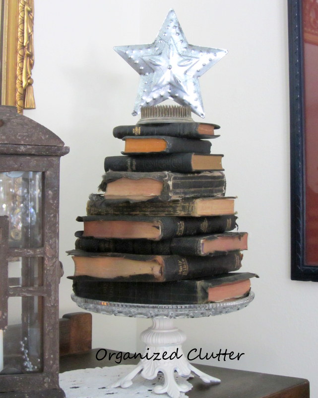 a nativity set a stacked bible christmas tree, christmas decorations, repurposing upcycling, seasonal holiday decor, A stacked and staggered Bible Christmas tree