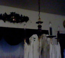 halloween decorating with black and white, halloween decorations, seasonal holiday d cor, wreaths, Ghost Chandelier white sheet strips It looks like the ghost is peeking out and holding a candle