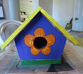 redoing an old bird house, crafts, I added the flower petals for a touch of whimsy and painted them orange I decided the pale yellow trim wasn t right so I redid the tum with a brighter yellow