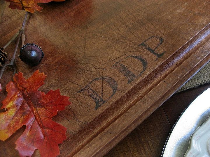 from thrift store cutting board to rustic monogrammed serving board, home decor, repurposing upcycling, I used a sharpie marker to create the monogram gave it a vintage look by sanding it and them finished it with stain