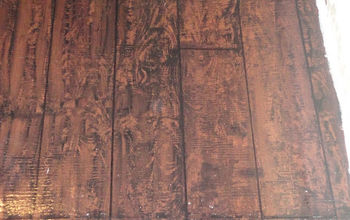I painted my awful underlayment to look like hardwood floors!  I &lt;3 it!