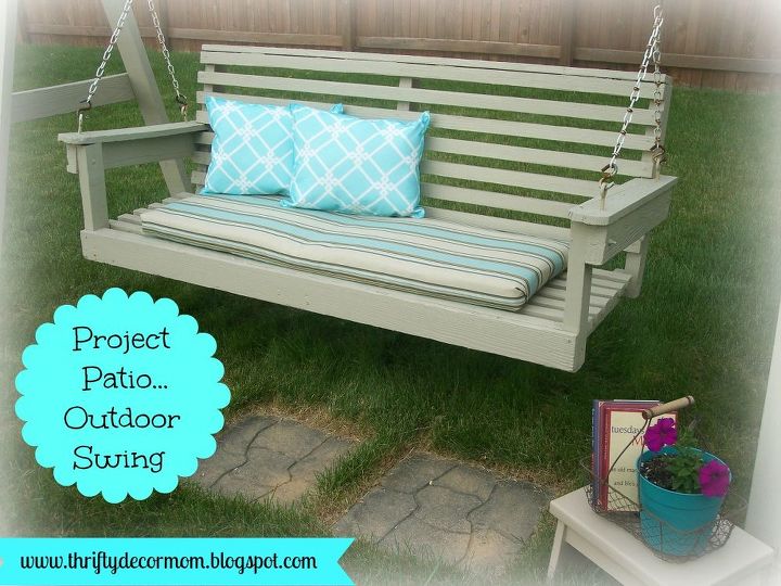 outdoor living space, outdoor living, Outdoor swing is the perfect place to read a book and relax Cushion made from outdoor fabric Pillows made from placemats