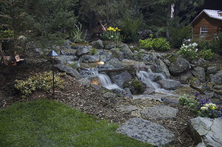 rocky mountain waterscape water feature, landscape, ponds water features, A pondless water falls built with moss rock wood and moss