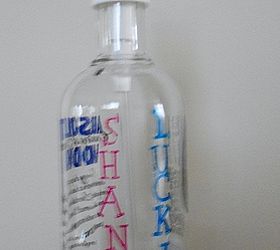 i upcycle an absolut vodka bottle into a soap dispenser and stamped the name, repurposing upcycling, side view