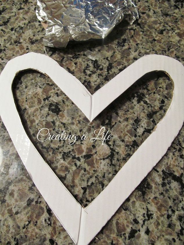 cupcake liner heart, crafts, seasonal holiday decor, Cut out a cardboard heart frame